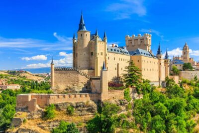 From Madrid: Guided Day Trip to Segovia and Toledo - Segovia’s aqueduct and cathedral square: where the wow starts