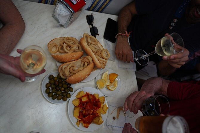 Madrid by Night: Tapas Crawl, Local Drinks & Hidden Gems - The shrimp and house wine moment that ties it together