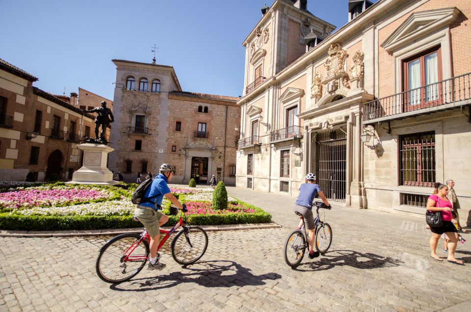Madrid City Guided Bike/E-Bike Tour for Small Groups - Alcalá Gate, Serrano, and San Antón: Leaving the Park for Real Life Streets