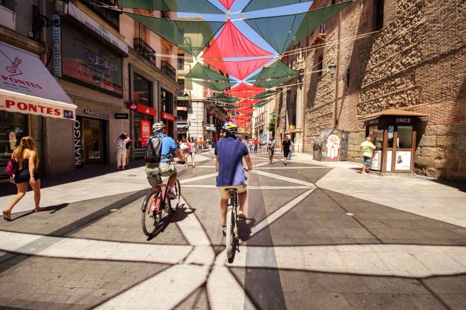 Madrid City Guided Bike/E-Bike Tour for Small Groups - Stop by Stop: Debod Temple, Royal Palace Area, and Almudena