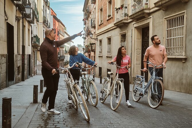 Madrid: City Highlights Guided Vintage Bike Tour - Royal Palace and Almudena Cathedral: what you can see in 20 minutes