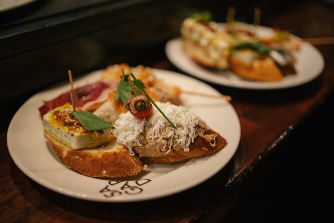 Madrid Food Walking Tour with Tapas and Vermouth - Cava de San Miguel: chorizo-stuffed mushrooms and tinto de verano