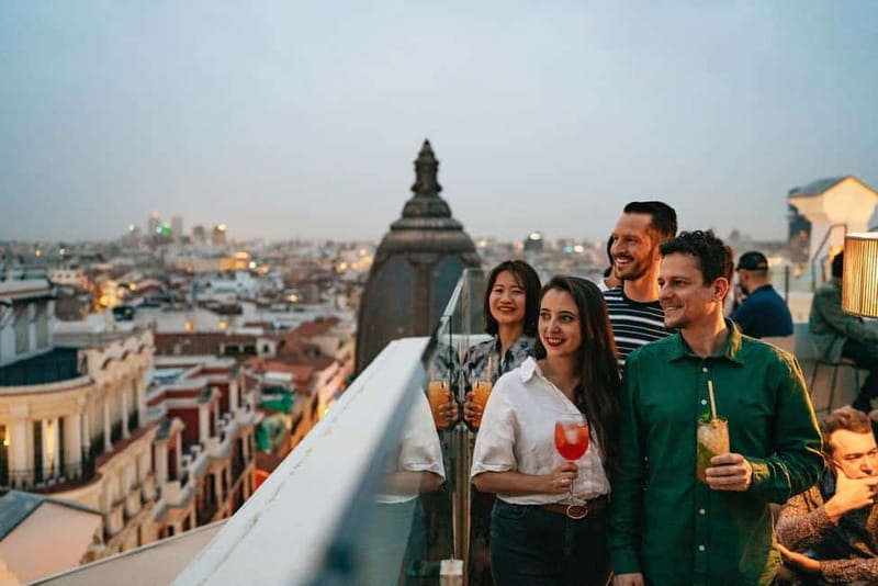 Madrid: Guided Tapas and Wine Tour with Terrace Visit - Key highlights at a glance