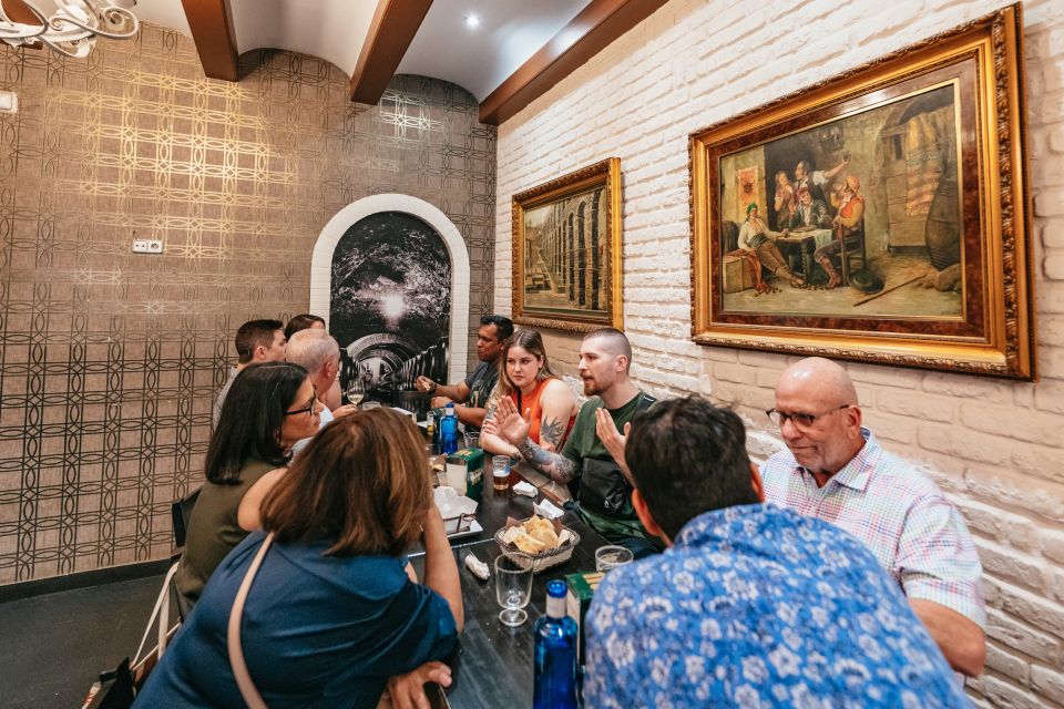 Madrid: Guided Tapas Tour with Tastings and Drinks - Stop 3: the slow-food tavern stop where ingredients take the mic