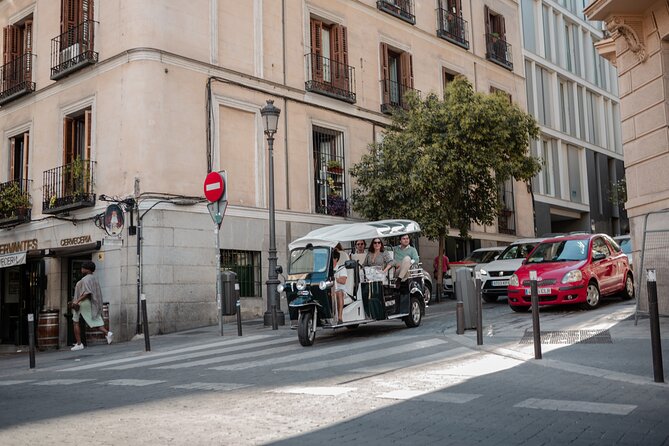 Madrid Historical Tour with Local Guide in Eco Tuk Tuk Private - The Covered Market Stop: Old-Madrid Food Energy