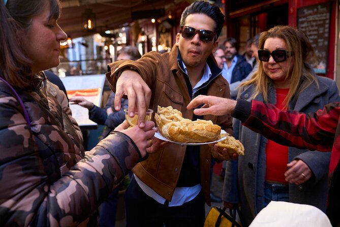 Madrid: Not Just Another Tapas & Wine Tour by Eating Europe - The Must-Eat Bites: From Jamón to Calamari to Sweet Chocolate