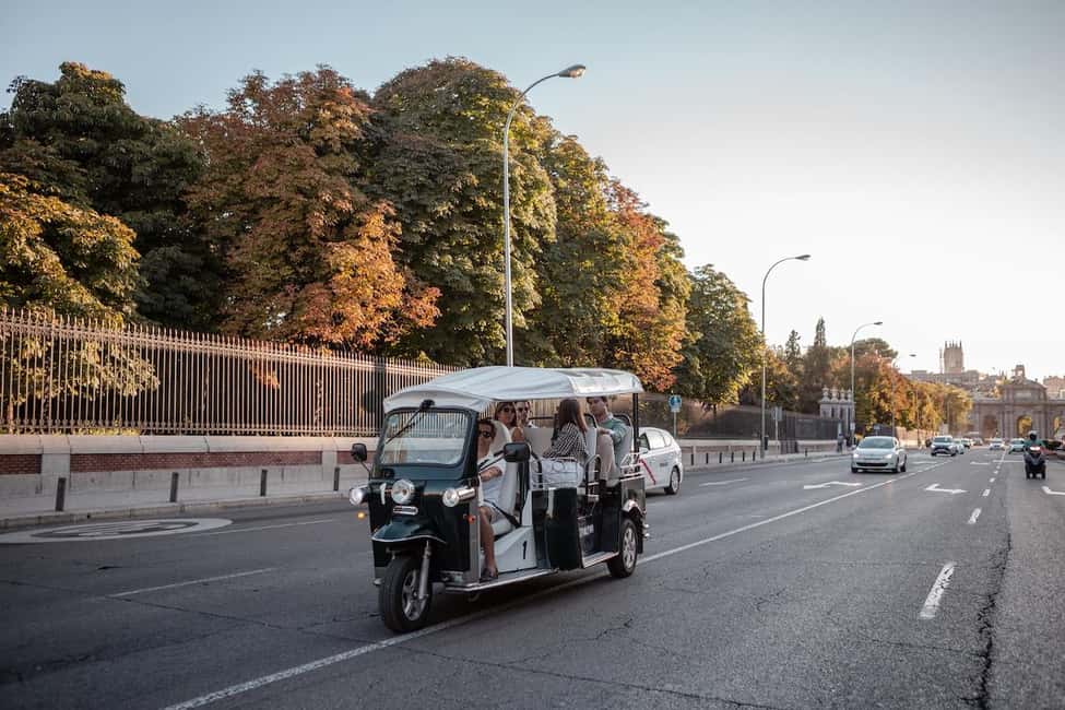 Madrid: Private City Tour by Eco Tuk Tuk - The Congreso, Neptune Fountain, and the Prado corridor