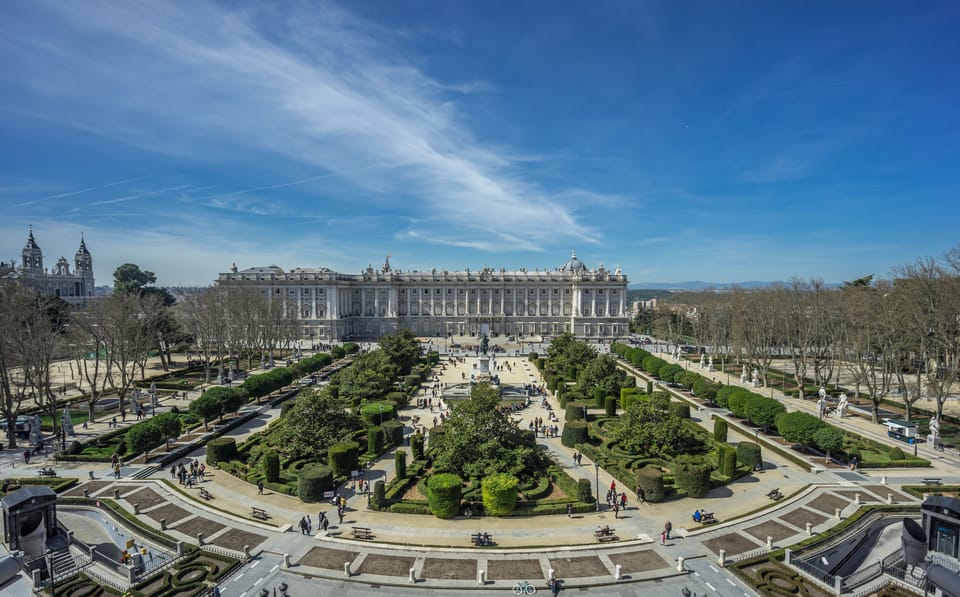Madrid: Royal Palace Guided Tour with Skip-the-Line Entry - Practical tips: shoes, bags, and photos inside the palace