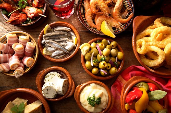 Madrid Tapas Experience Walking Tour - Stop 2, Casa Revuelta: deep-fried cod that changes your idea of seafood