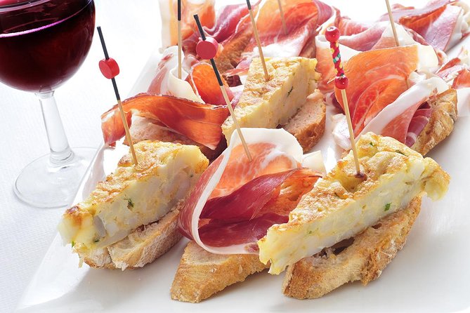 Madrid Tapas Experience Walking Tour - Meeting at Plaza Mayor and ending in Huertas (so plan your transport)