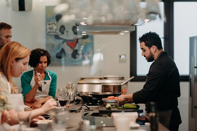 Madrid Tapas & Paella Cooking Experience with Local Market Visit - Eating Together: Lunch, Seasonal Fruit, and Drinks