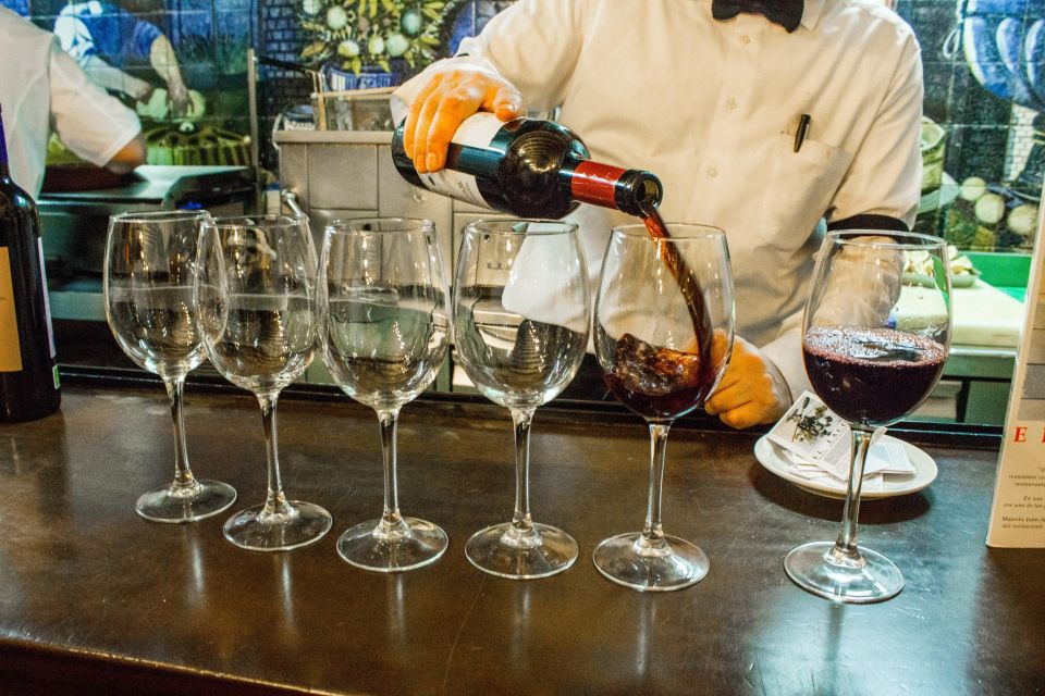 Madrid: Tapas & Wine Tasting Tour with Local Guide - Drinks, food, and the I’m-full-but-happy effect