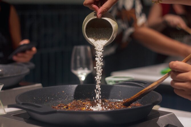 Paella Cooking Class in Madrid with Bottomless Wine Pairing - Your Madrid Tasting Menu: From Cured Meats to Churros