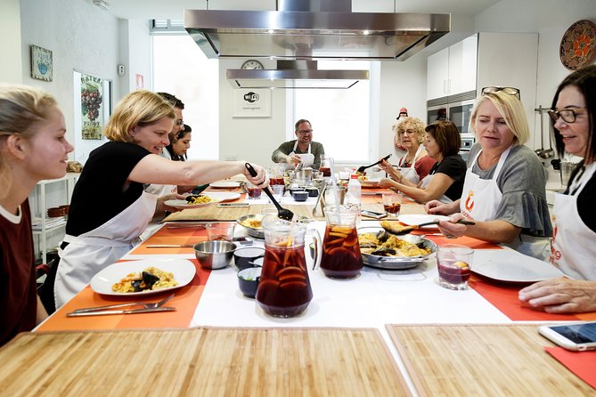 Spanish Cooking Class Paella Tapas and Sangria in Madrid - What you can expect in the kitchen: prep, cooking, and shared meals