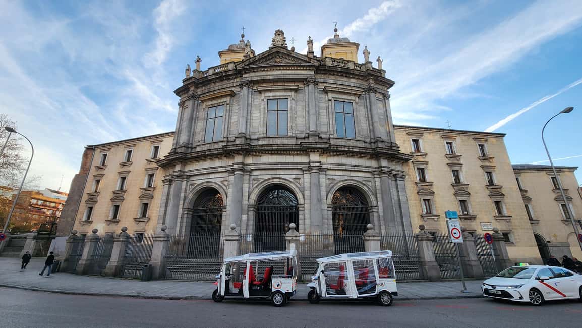 Tour Madrid: Secrets in a Electric Tuk Tuk - Plaza de España: Cervantes Towering Upwards